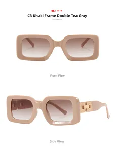 Detail view of khaki narrow rectangular sunglasses with gradient lenses and H-shaped metal link