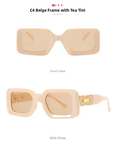 Detail of cream square sunglasses featuring brown lenses and golden geometric metal hinges