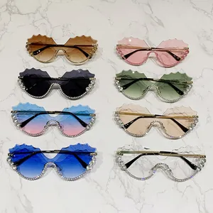 Oversize rimless rhinestone sunglasses for women with wavy edge and metal temples