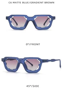 Detalle de gafas de sol geométricas azul mate con montura calada y cristales degradados