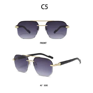 Detail der C5 randlosen Pilotensonnenbrille mit lila Verlaufsgläsern und Goldsteg