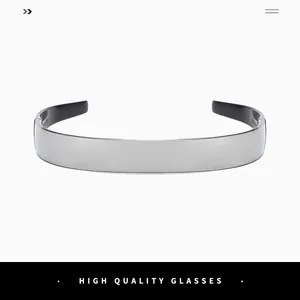 Close-up of futuristic silver wrap-around visor sunglasses with reflective mirror finish