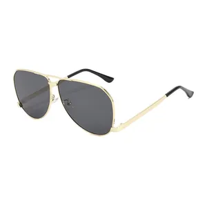 Classic aviator sunglasses with gold metal frame and dark lenses from 45-degree angle