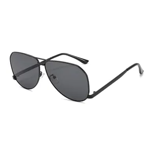 Classic black metal aviator sunglasses with dark grey UV protective lenses on white background