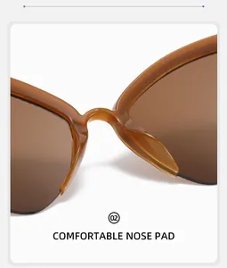 Detail view of comfortable nose pads on stylish amber cat-eye sunglasses for women