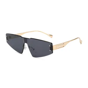 Fashionable rimless oversized sunglasses with dark grey lenses and gold metal temples