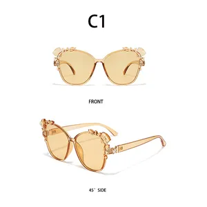 Front and side view of butterfly sunglasses with diamond accents and light tea lenses