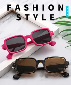 Detail view of retro square sunglasses frames in rose pink and tortoiseshell finishes