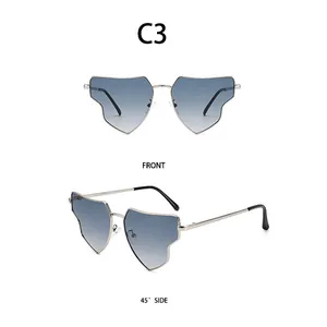 Detail view of heart-shaped silver sunglasses with gradient blue lenses and slim metal frame