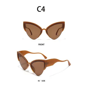 Detail view of brown cat-eye sunglasses with unique textured frame and wave temples