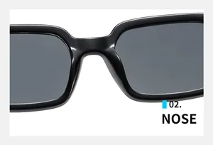 Macro shot of integrated nose bridge on glossy black square sunglasses frame