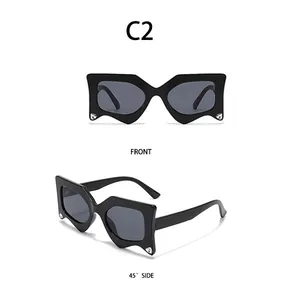 Front and side view of black geometric sunglasses with rhinestones along the lower frame
