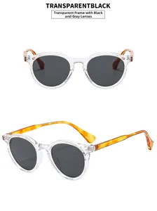 Detail of round sunglasses with transparent frame and black grey lenses in retro style