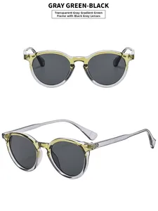 Detail view of round vintage sunglasses with transparent gray-green frames and dark lenses
