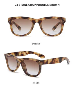 Detail view of double brown leopard print sunglasses with stones grain finish