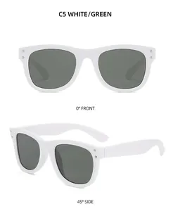 White leopard frame sunglasses with green UV400 lenses and silver rivet details