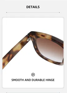 Close-up of durable metal hinge on leopard print sunglasses with gradient brown lens