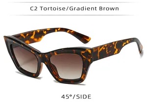 Cat-eye tortoiseshell sunglasses featuring gradient brown lenses shown from a 45-degree angle