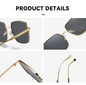 Detailed macro view of golden metal square frame sunglasses with embossed monogram temples