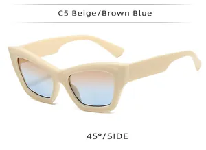 Side view of beige cat-eye sunglasses with brown to blue gradient lenses at a 45-degree angle