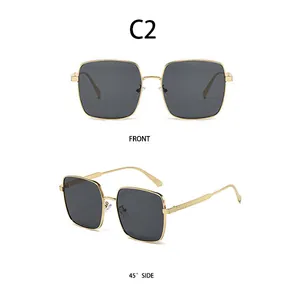 Front and side 45 degree views of gold metal square frame sunglasses with black lenses