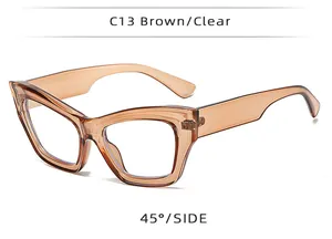 Detailed side view of translucent brown cat eye sunglasses frame at 45 degree angle