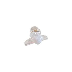 Mini heart hair claw clip with white marble texture and durable metal spring