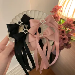 Rosafarbene und schwarze Satin-Schleifen-Haarspangen mit funkelndem Stern-Strass