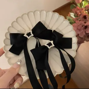 Rosa Satin-Schleife Haarspangen mit Silberstern-Strasssteinen und langen eleganten Bändern