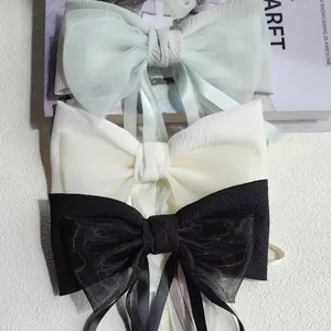 Set di tre fermagli per capelli in tulle con fiocchi eleganti in verde, bianco e nero
