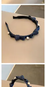 Detail of denim bow headband with white pearls on a minimalist black frame base