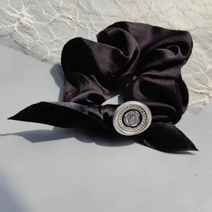French vintage black satin scrunchie with bow and rose metal buckle accent
