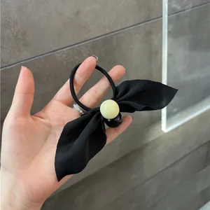 Korean style black chiffon bow ponytail holder with decorative yellow and black beads