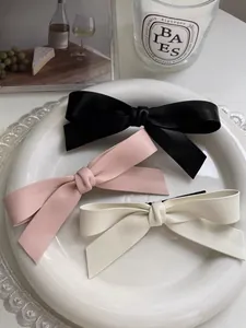 Lot de 3 barrettes à cheveux avec nœuds en cuir mat en noir, rose et blanc crème doux