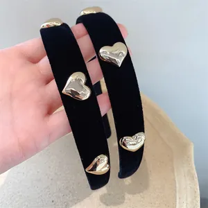 Elegant black velvet headband with golden metallic hearts for girls daily hair styling