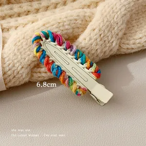 Close-up of 6.8cm colorful crochet knit hair clip with rainbow weave details