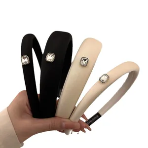 Elegant vintage sponge padded headbands with rectangle crystals in black and cream beige