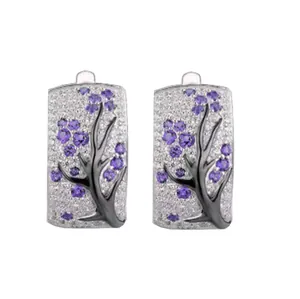 Fashionable floral hoop earrings with black branch pattern and purple rhinestones
