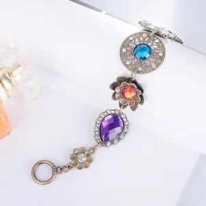 Bracciale vintage in bronzo con fiori di cristallo colorati e gemme stile bohémien