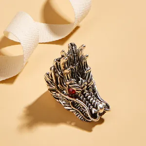 Bague tête de dragon rétro en argent vintage avec yeux en pierres rouges