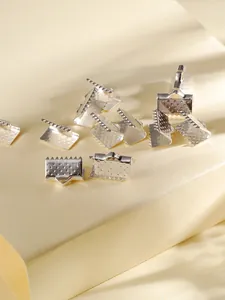 Terminales de metal plateado con bordes dentados para la creación de joyas DIY