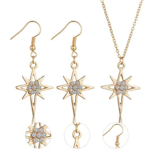 Luxurious gold-plated starburst jewelry set with sparkling rhinestones and matching earrings