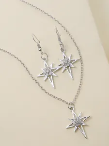 Elegant silver starburst jewelry set with necklace and drop earrings encrusted in rhinestones