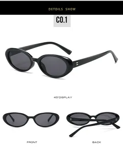 Detailed views of vintage oval sunglasses with black frames from front and side angles