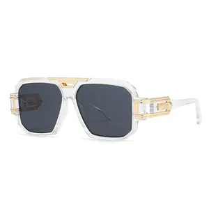 Modern oversized square sunglasses with transparent frames and gold metal accents