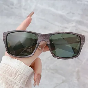 Square polarized outdoor sunglasses featuring a textured dark wood grain frame