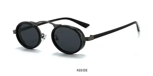 Vue latérale de lunettes de soleil steampunk ovales avec monture noire et détails en métal