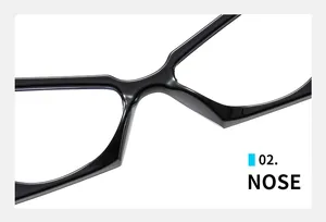 Detail of the ergonomic nose bridge on black cat-eye glasses with polygonal frame design