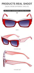 Vue sous trois angles de lunettes de soleil œil-de-chat rouges à verres dégradés
