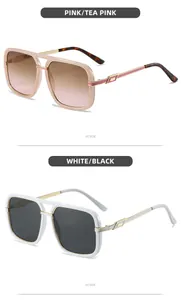 Detail view of large square sunglasses in pink and white frames with metal accents